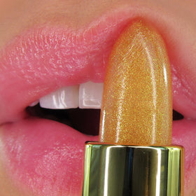 Winky Lux swatch on arm revealing warm pink tint that personalizes to skin pH