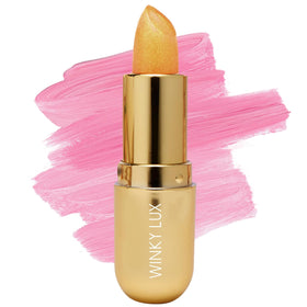 Winky Lux front packaging showing jewel-shaped citrine balm and brand name for gift-ready appeal