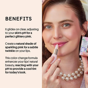 Winky Lux balms in hand for scale, showing travel-friendly size and convenience