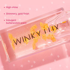 Winky Lux close-up of suspended golden stars delivering delicate sparkle