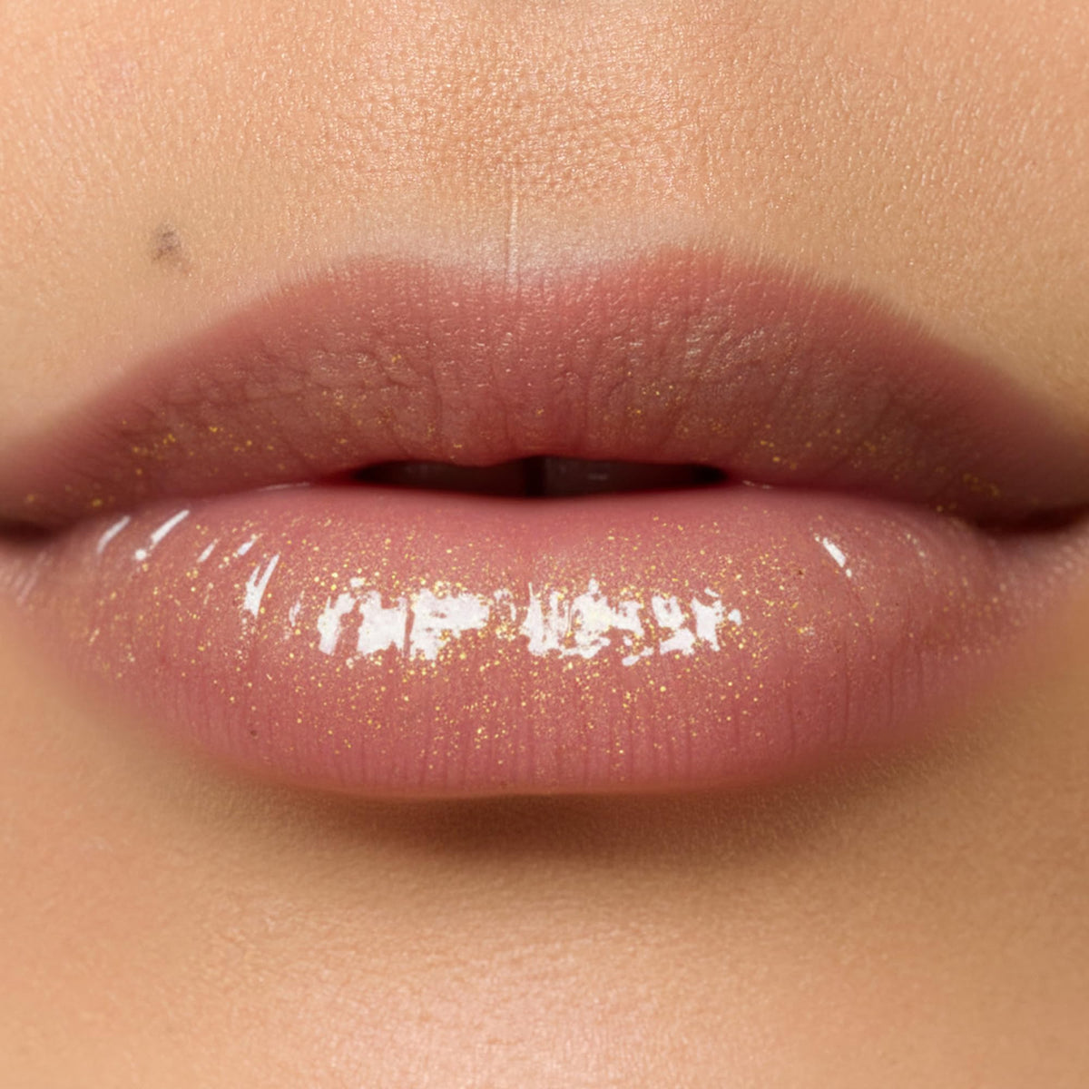 Winky Lux wand and applicator ready for smooth, precise application
