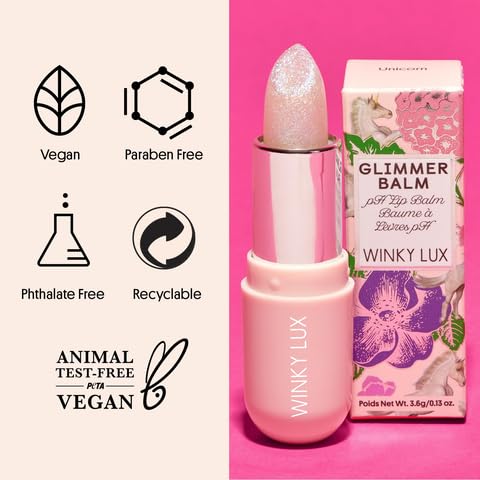 Winky Lux duo on a vanity with flowers illustrating daily routine and playful self-care