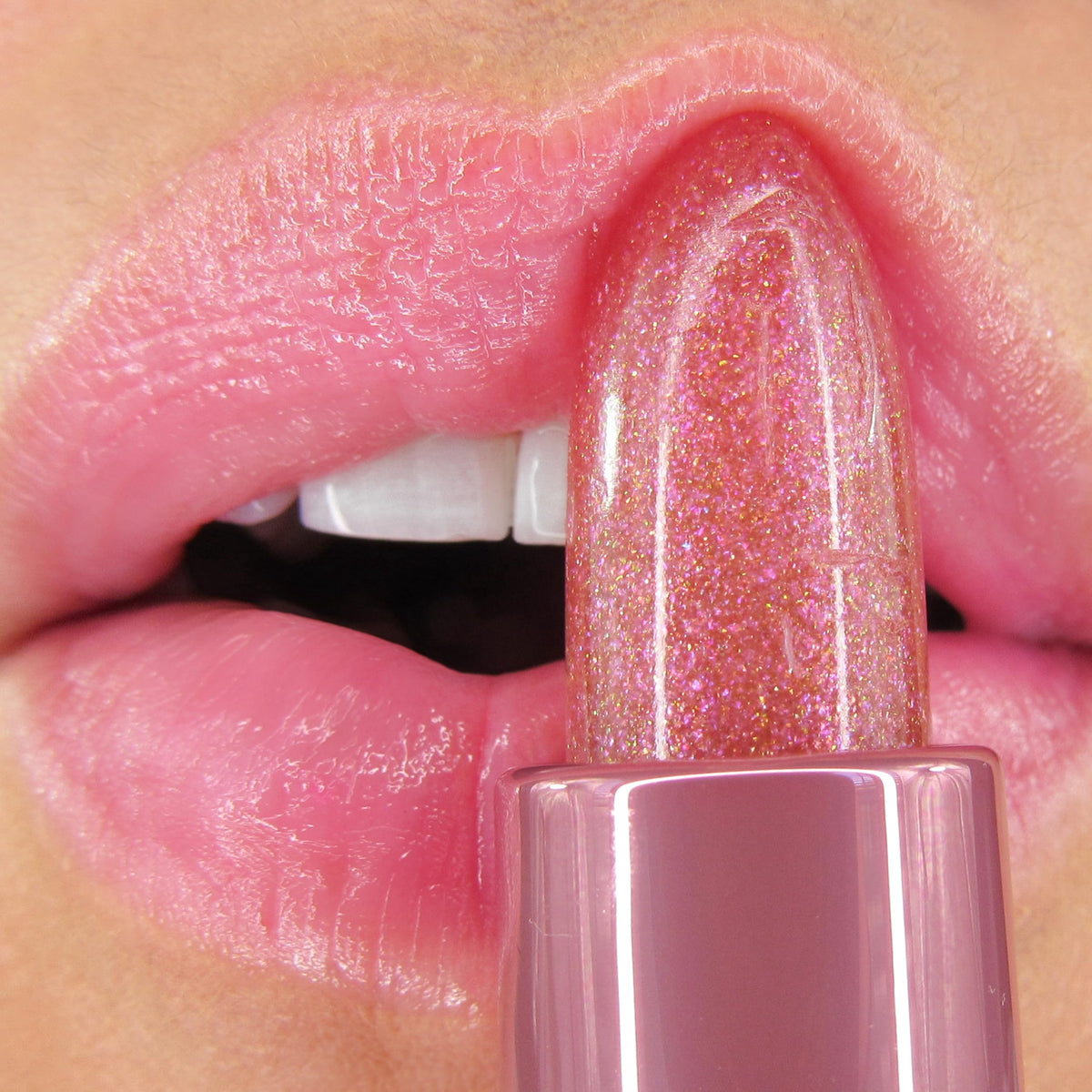 Winky Lux application on lips illustrating personalized tint and glossy hydration