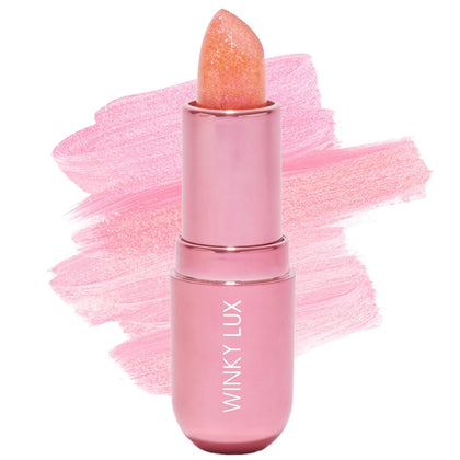 Winky Lux front packaging showcasing compact jewel balm and playful branding benefits