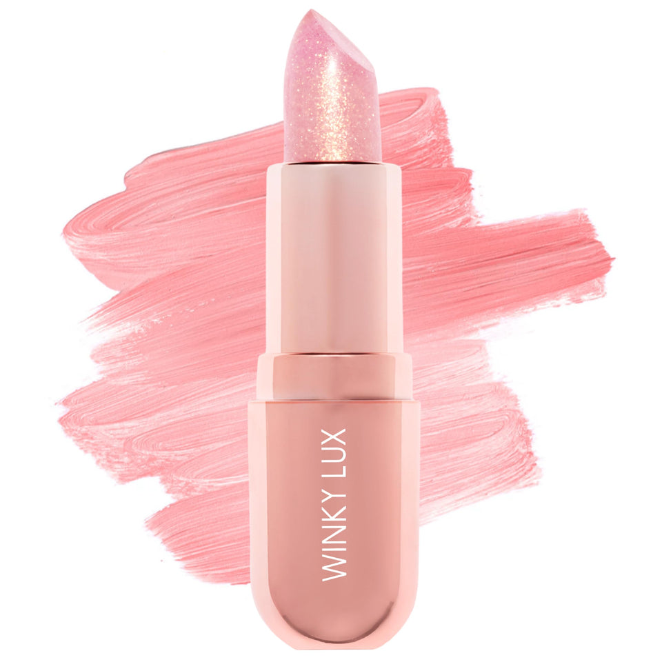 Winky Lux front packaging showing compact glimmer balm and brand benefit