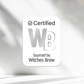 Witches Brew bottle on bathroom shelf in lifestyle setting showing everyday use