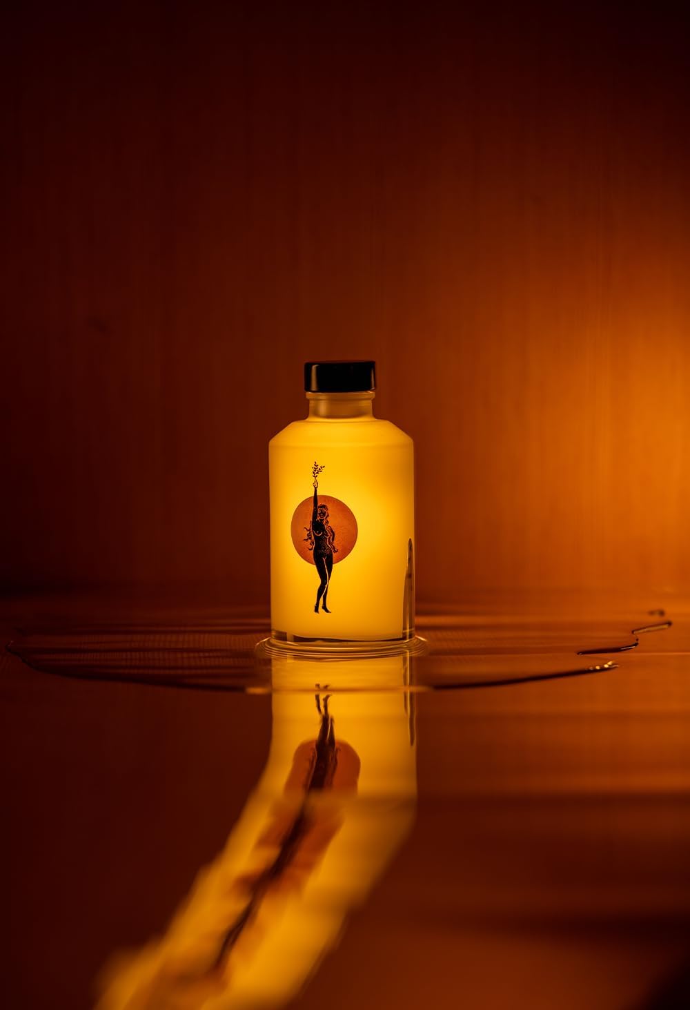 WONDER VALLEY bottle next to everyday objects showing 200 ml scale for size clarity