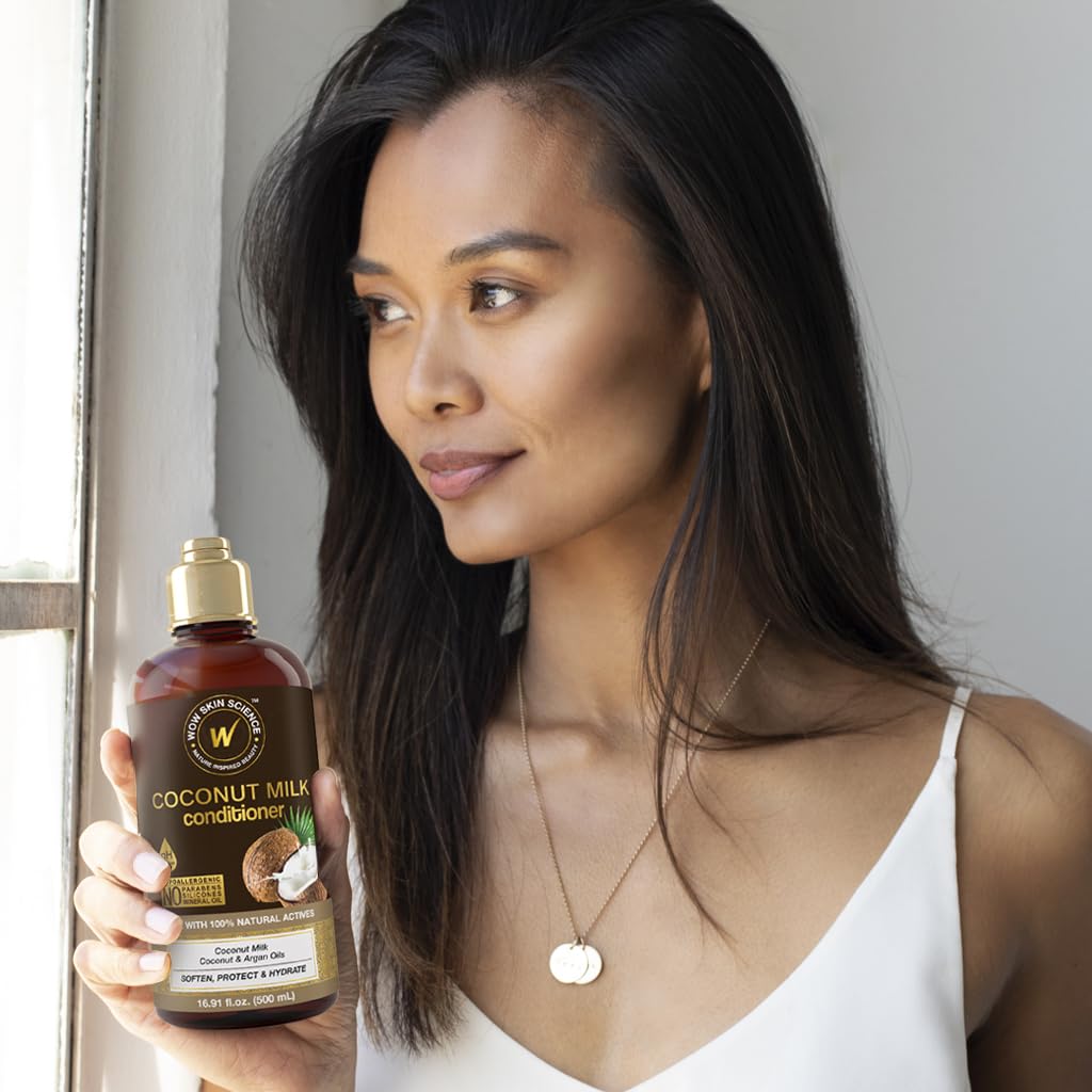 WOW Skin Science bottle in hand to show 16.9 oz scale and travel-friendly benefit