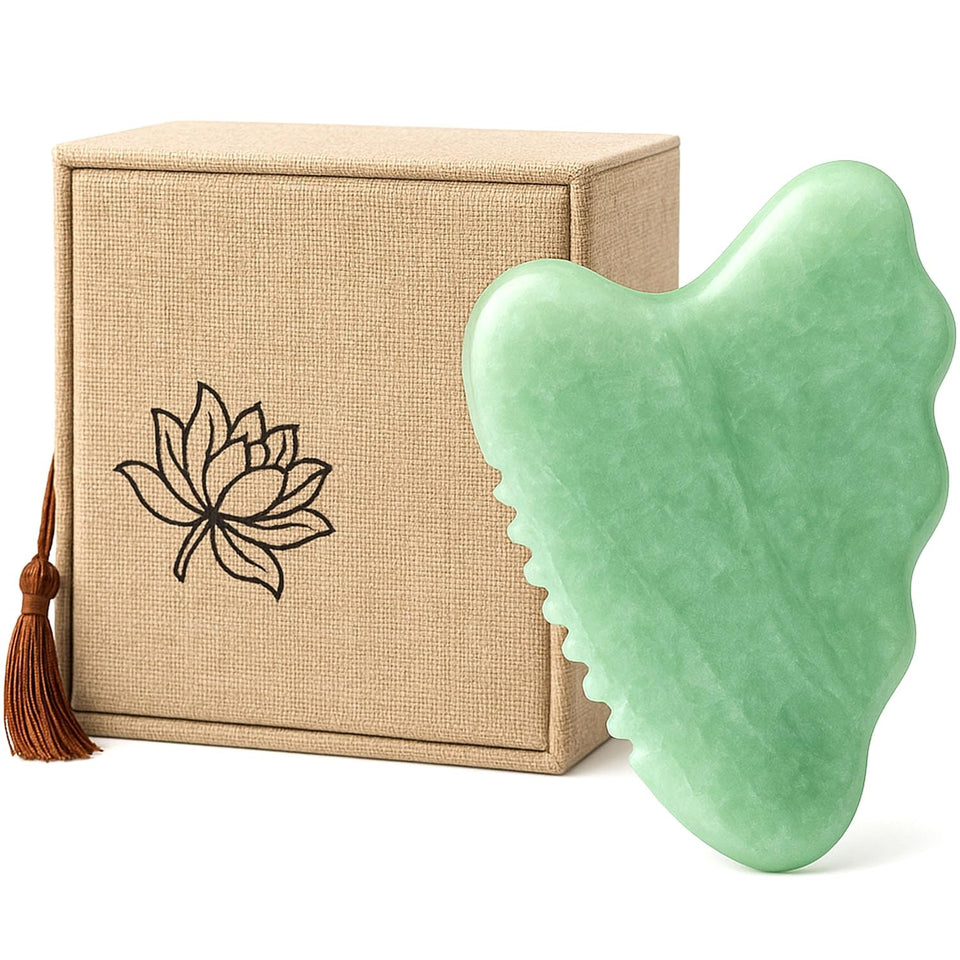 WYGOAKG front view of jade gua sha showing shape and comb edge for sculpting