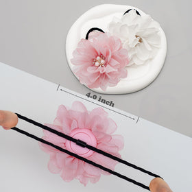 XEEWEN hair tie wrapped on wrist and backpack showing versatile tracking placement