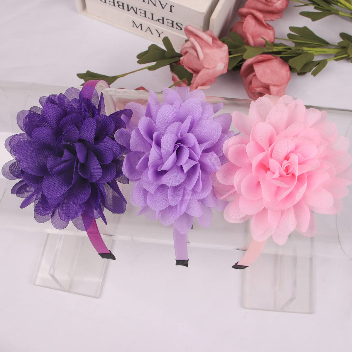 XIMA headband worn by child in lifestyle scene showing fit and pretty floral accent for photos
