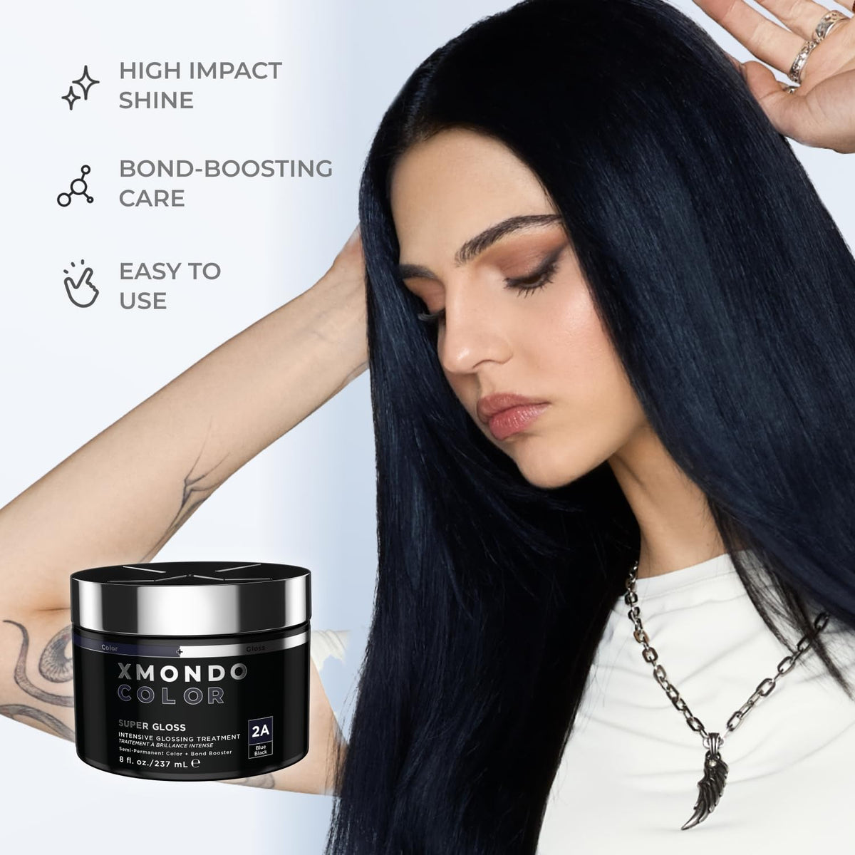 XMONDO on model with long hair showing deep blue-black shine and repair