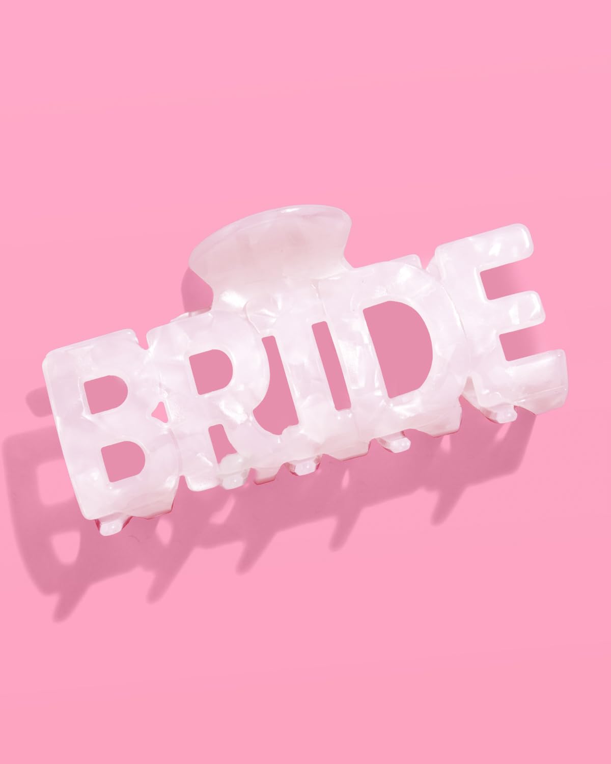 xo, Fetti clip displayed in gift bag illustrating perfect bachelorette favor