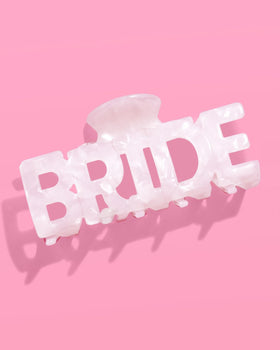 xo, Fetti clip displayed in gift bag illustrating perfect bachelorette favor