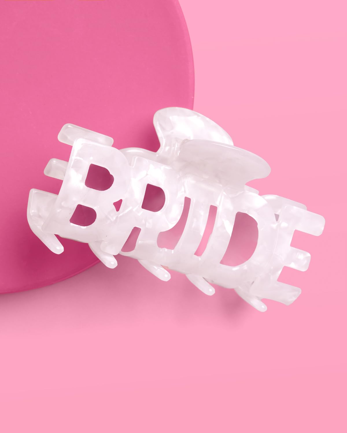 xo, Fetti clip worn in hair during getting-ready scene adding bridal flair