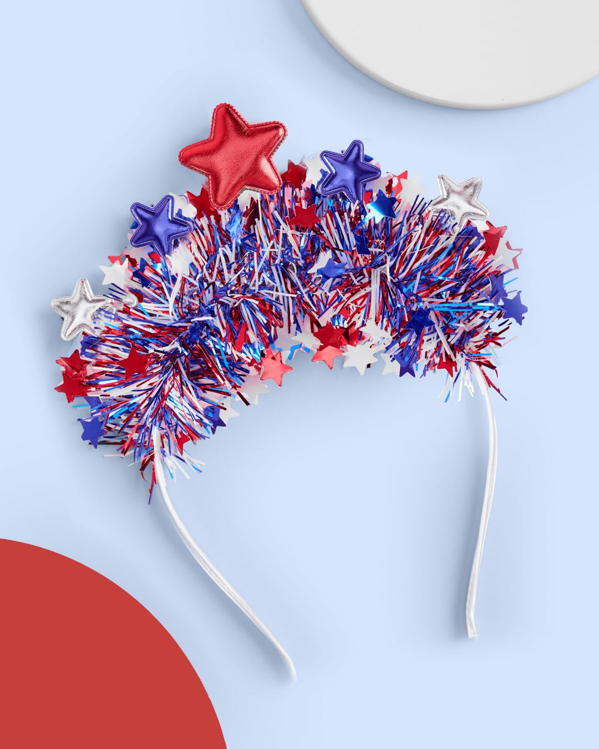 xo, Fetti close-up of layered star detail adding festive dimension and eye-catching appeal