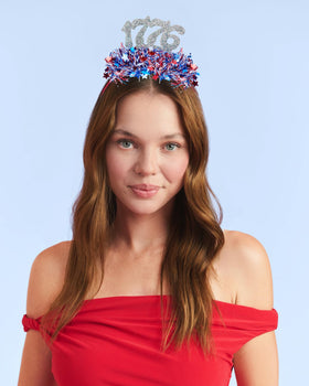 xo, Fetti headband worn at parade conveying festive energy