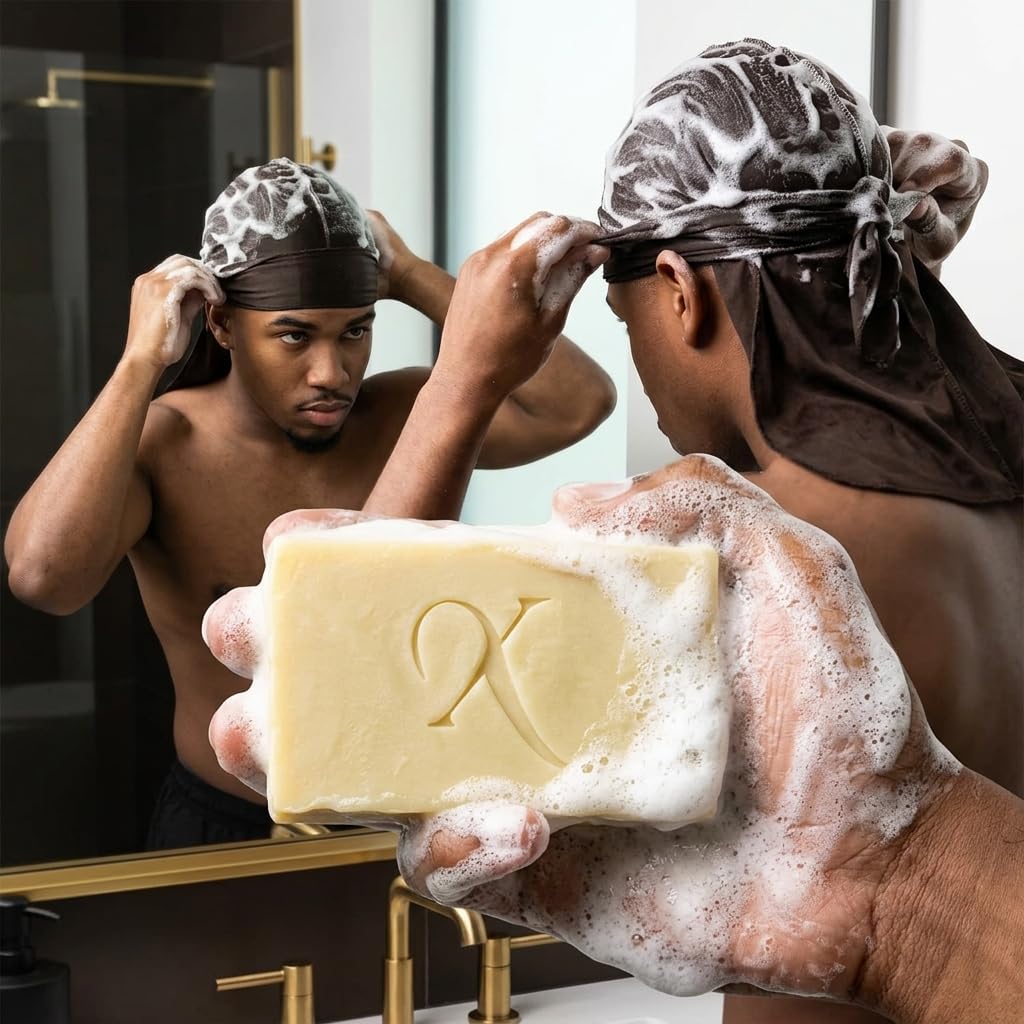 Xotics by Curtis Smith bar next to hand showing 5oz size and travel convenience