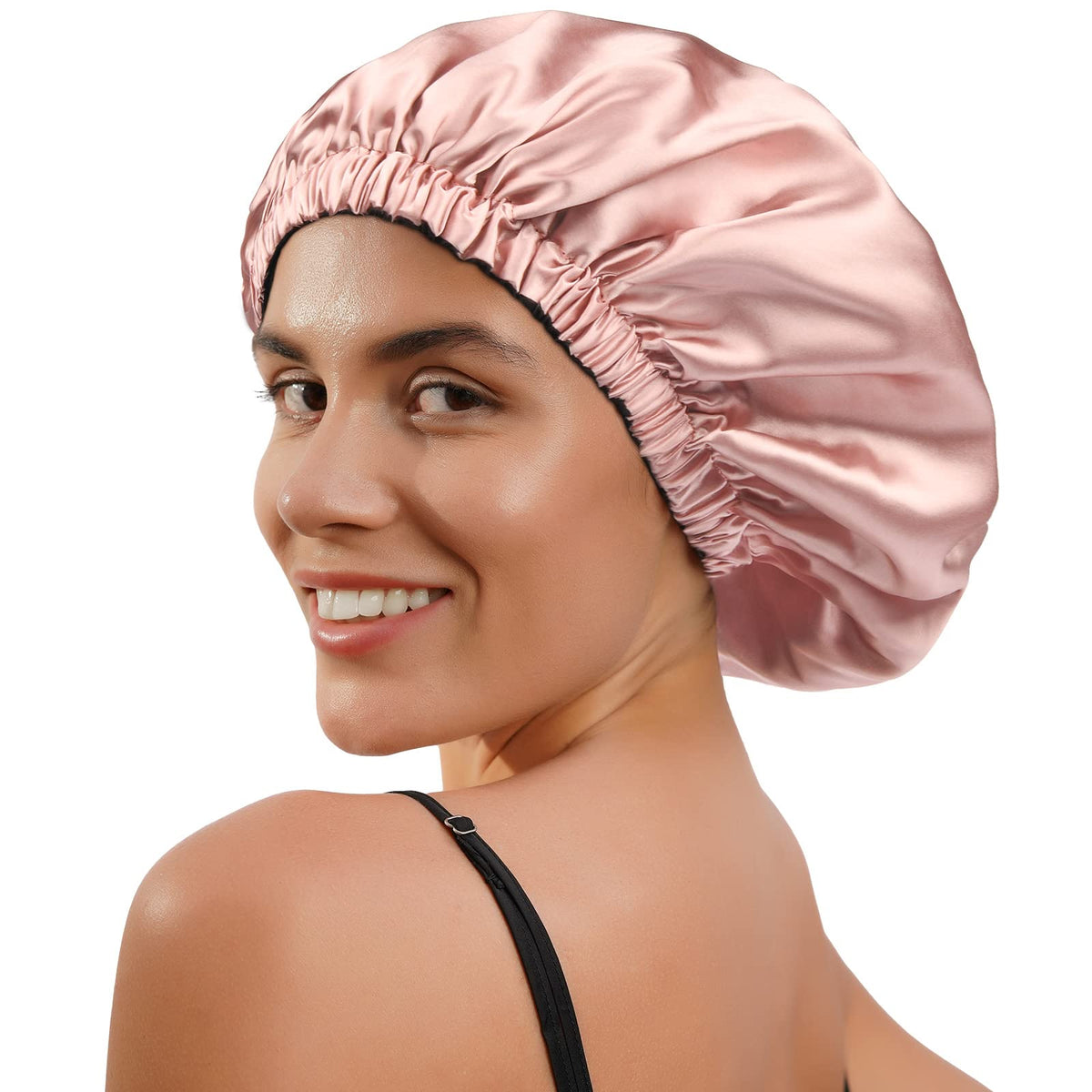 YANIBEST bonnet next to hand showing roomy size for thick hair