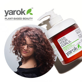 YAROK FOOD FOR YOUR HEAD applying cream to damp curls for defined results