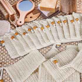 Ycolama soap bag hanging to dry by loop showing long-life benefit