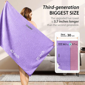 YFONG towel next to chair showing large 30x40 size for full coverage