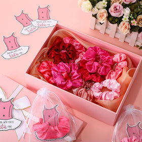 Yinkin party table display of favors showing cohesive ballet-themed decor