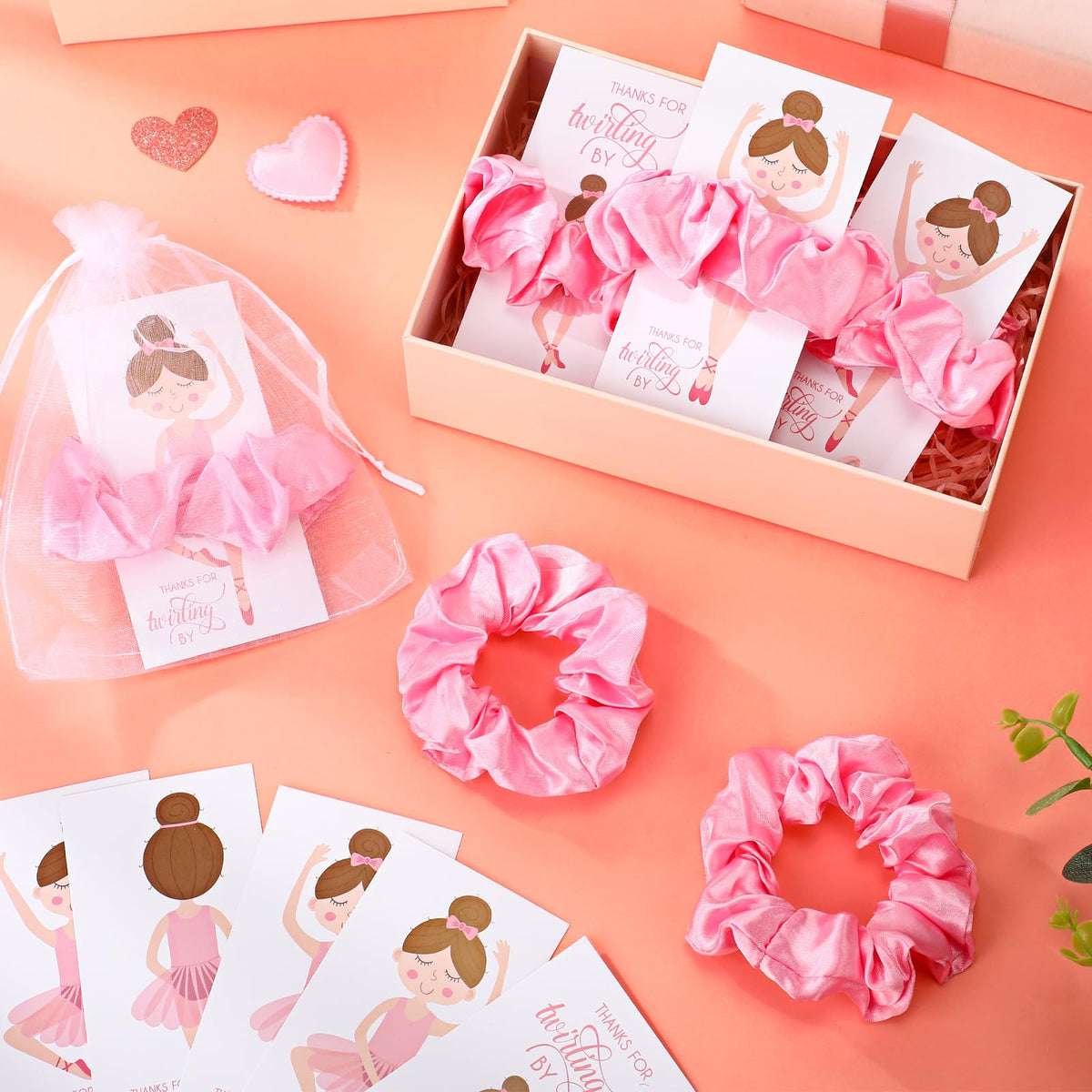 Yinkin organza bag holding scrunchie and card for neat presentation and quick distribution