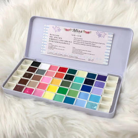 YJMyujimi iron case open showing organized 40 gel squares for easy selection