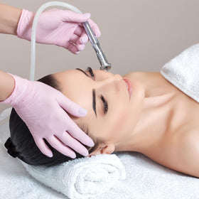 Yofuly lifestyle bathroom setup showing device ready for at-home facial benefit