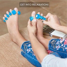 YogaToes GEMS in use on bare feet demonstrating gentle toe separation