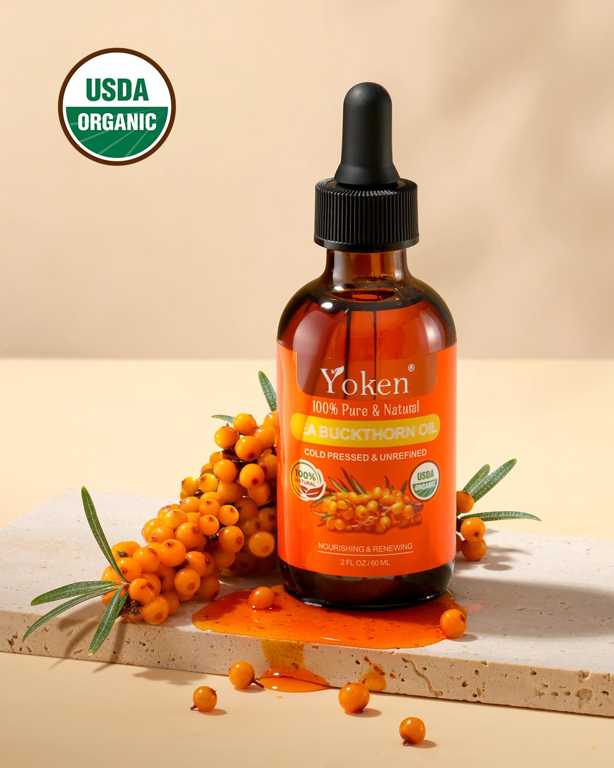 Yoken dropper pouring oil into hand for controlled, mess-free application