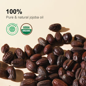 Droplet of Yoken jojoba oil being poured demonstrating controlled application