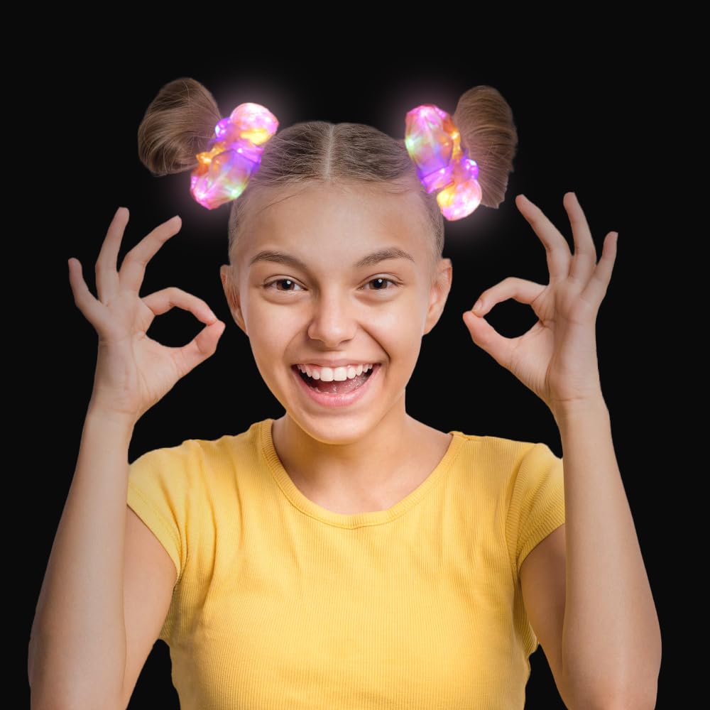 Yomwig scrunchie next to a hand to show scale and wearable lightweight comfort
