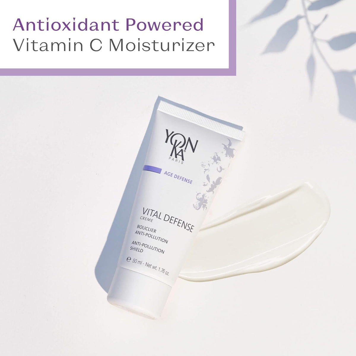 Woman applying cream before heading outdoors, Yonka defends against pollution