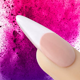 Young Nails brush dipping into powder demonstrating ease of pick-up and control