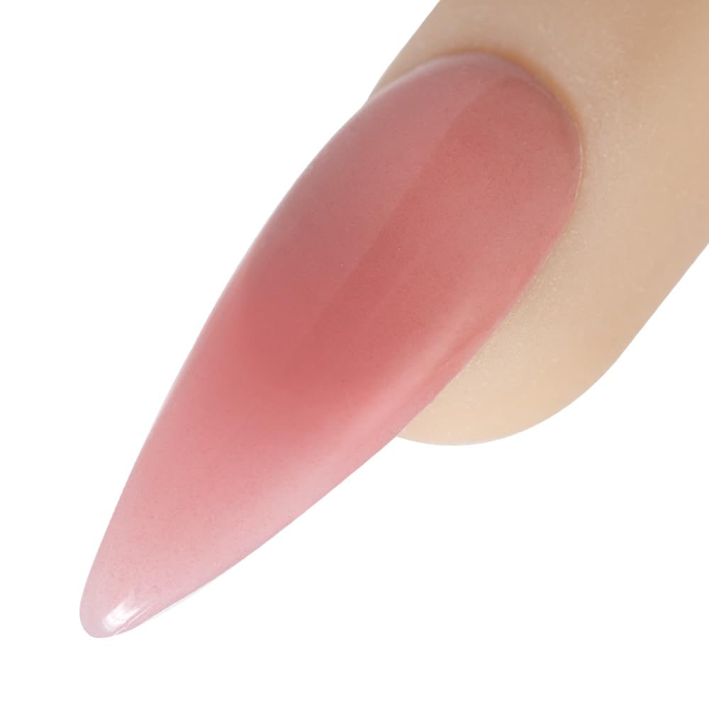 Young Nails Flamingo applied on nail during service showing natural pink-nude finish and fast setting benefit