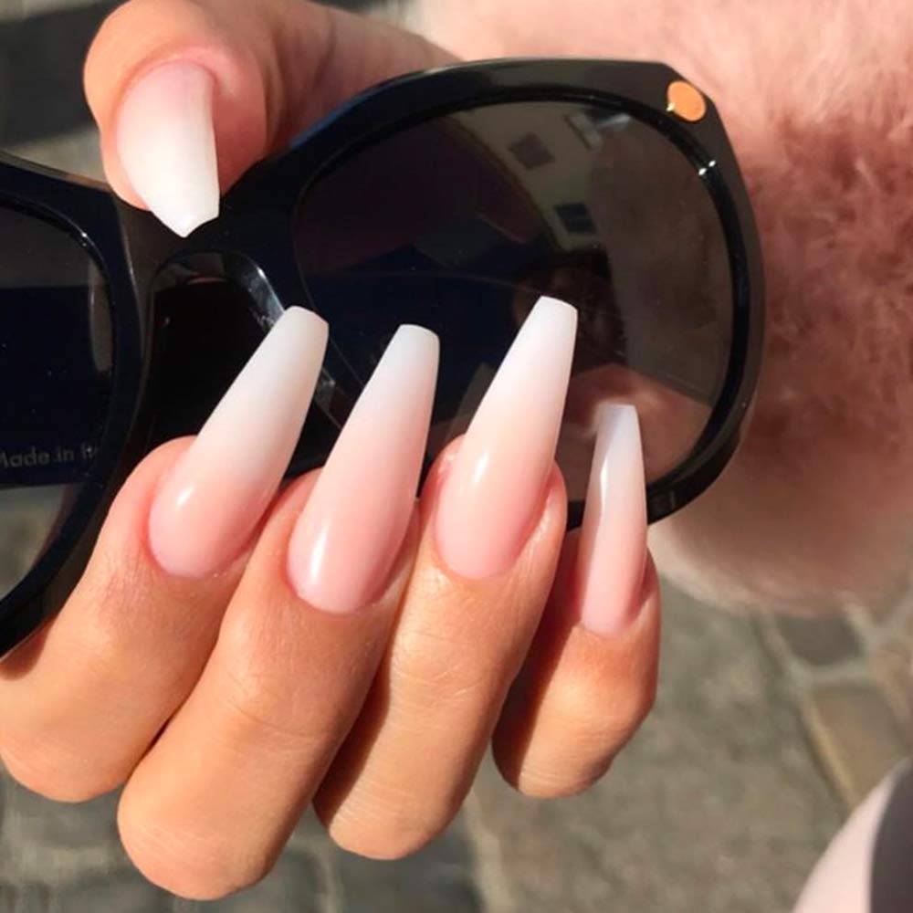Young Nails top coat in salon setting protecting nails from hair dye stains