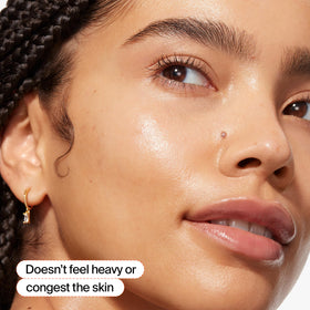 Youth To The People oil on hand scale demonstrating a few drops provide full-face coverage