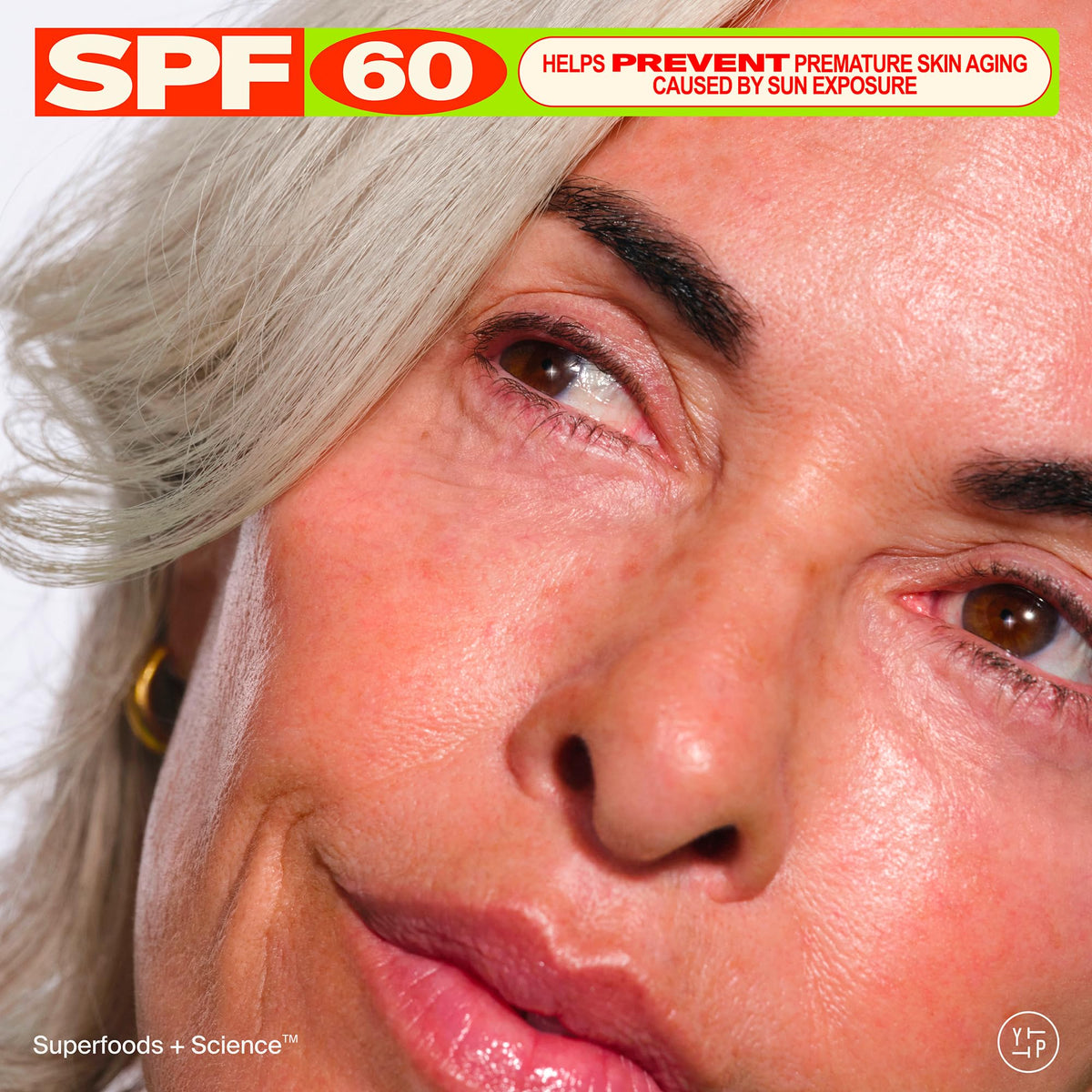 Youth To The People swatch on skin showing no white cast and dewy finish
