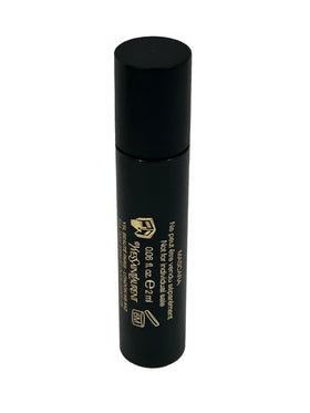 Yves Saint Laurent mascara texture swiped on paper showing rich pigment and buildup control