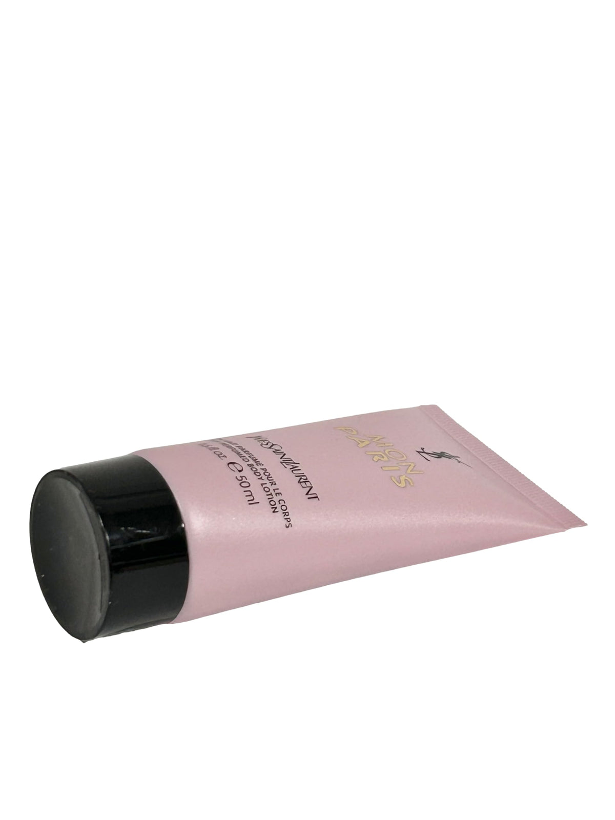 Yves Saint Laurent Mon Paris lotion texture close-up demonstrating lightweight, absorbent cream