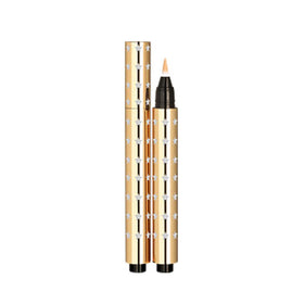 Yves Saint Laurent product applied under eye demonstrating brightening benefit