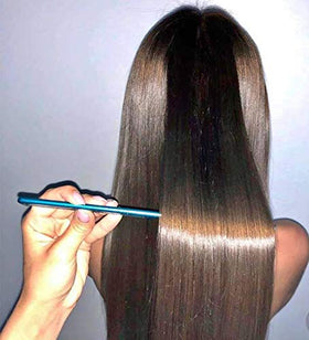YSSER Evans product being applied to hair demonstrating precise application