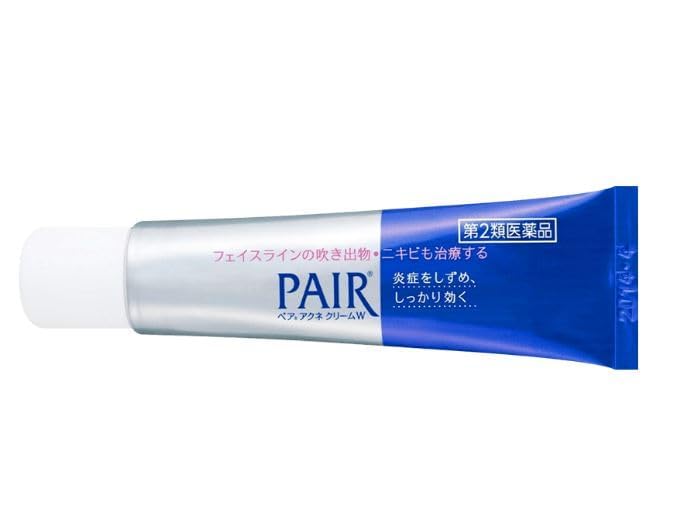 Yummy-Yamaguchi applying cream to jawline to calm inflammation and reduce bumps