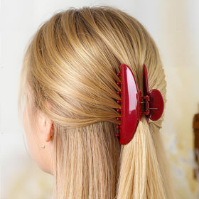 Yuxung clip in use holding half-up hairstyle for quick, secure styling benefit