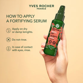 Yves Rocher applying serum to damp hair to protect from heat and smooth strands benefit