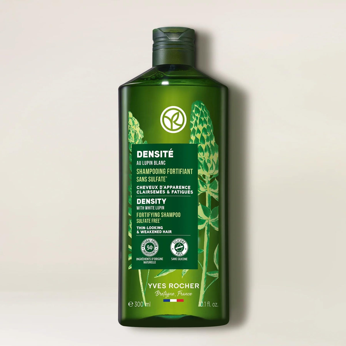 Yves Rocher shampoo in shower being applied to scalp for strengthening