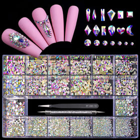Yzzseven front box and contents showing organized rhinestone storage and tools for convenience