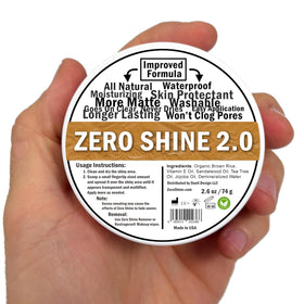 Zero Shine jar in studio lifestyle shot showing camera-ready matte result